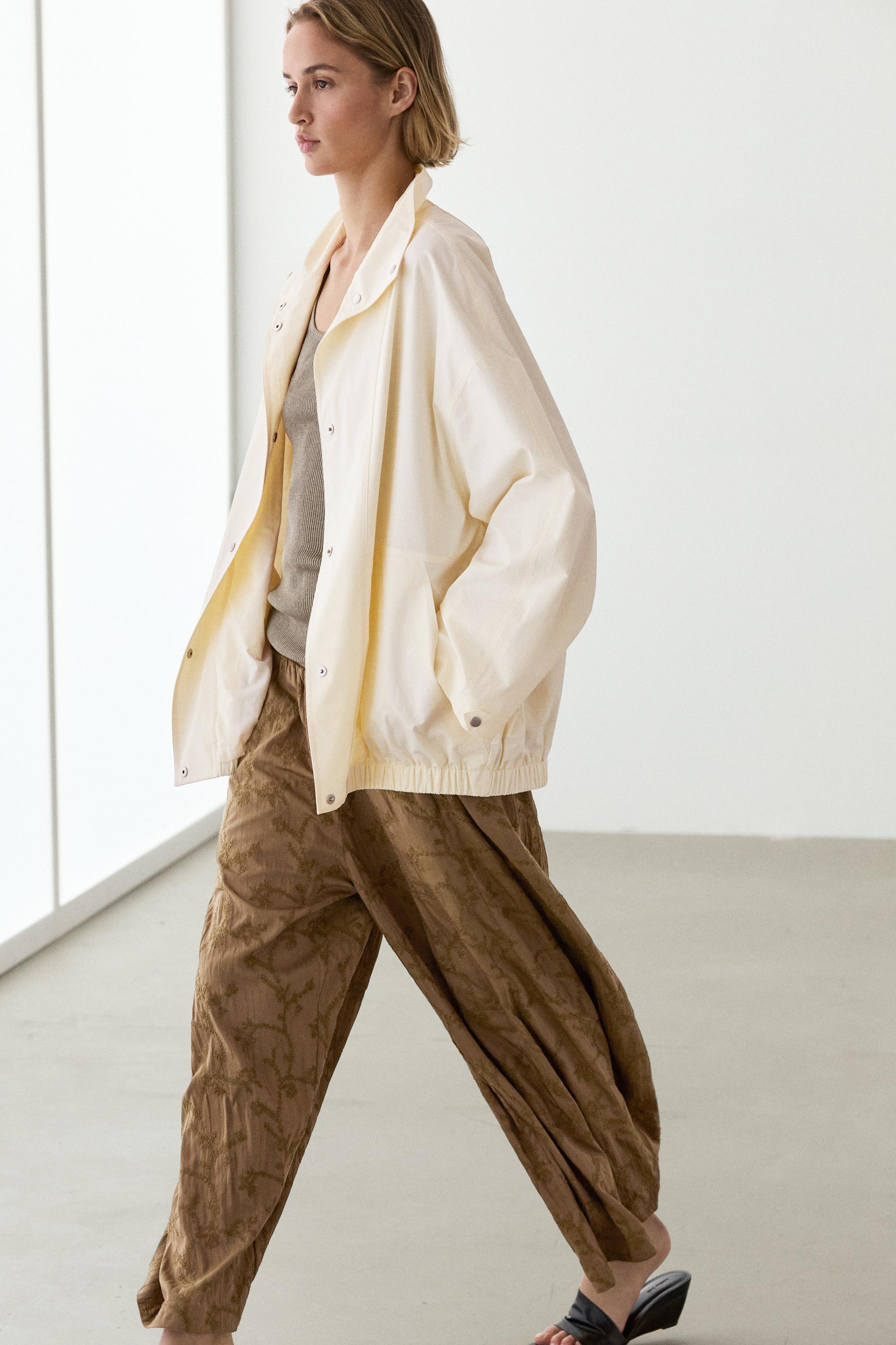Bomber jacket with snap buttons
